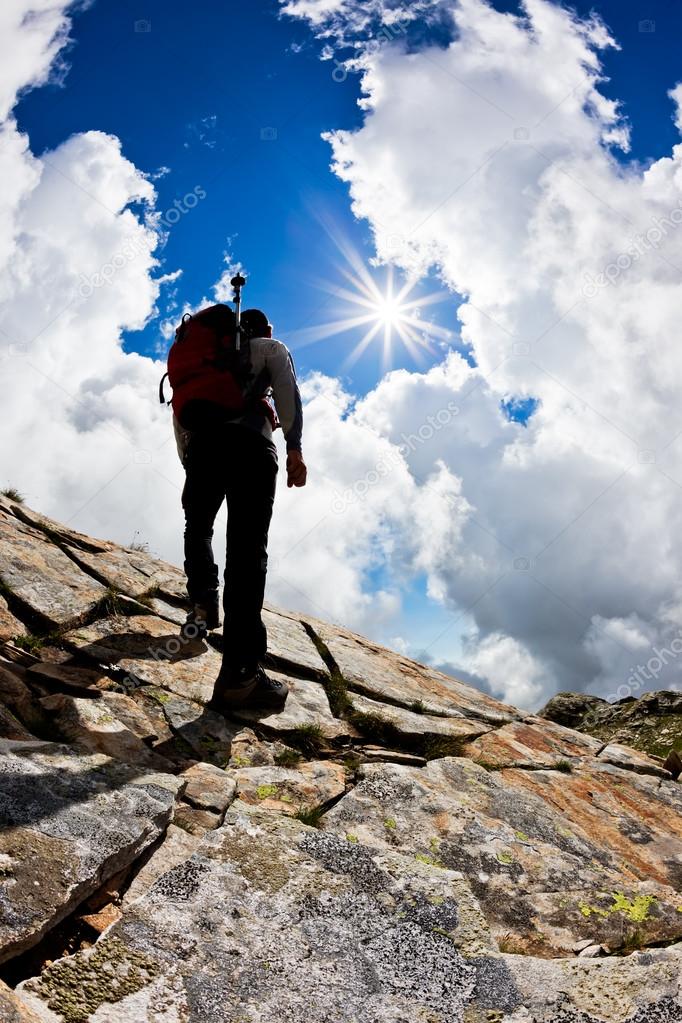 Man hiking up mountain