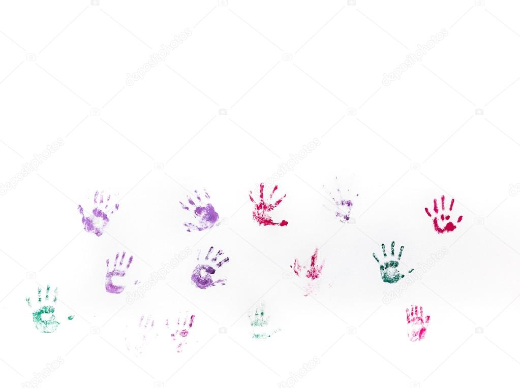 Children's hand prints on white wall