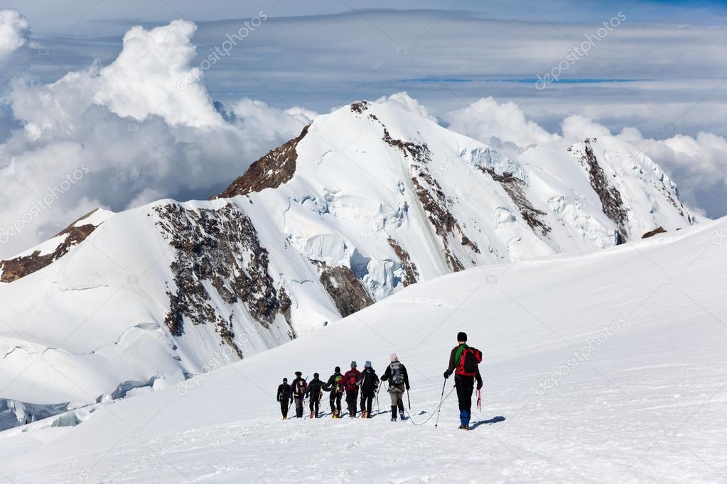 Mountaneers walking on a glacier