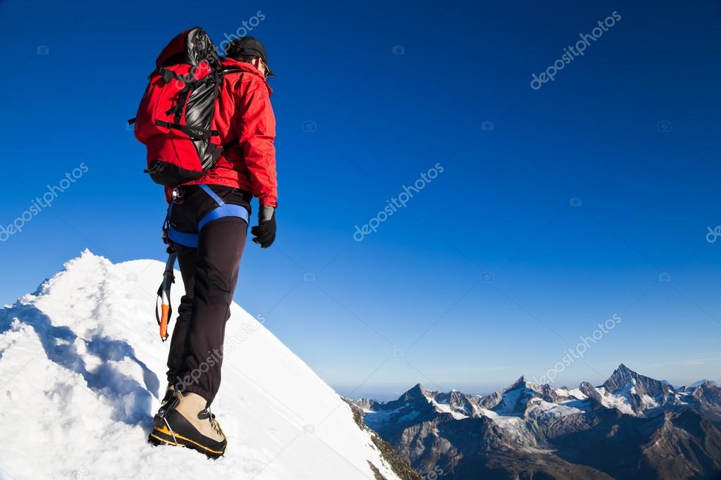 Alone mountaineer reaches the top