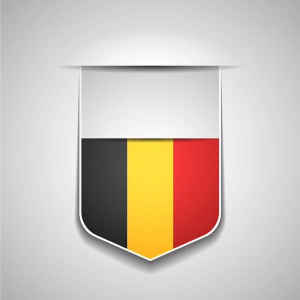 Drapeau de Belgique sur bouclier — Image vectorielle