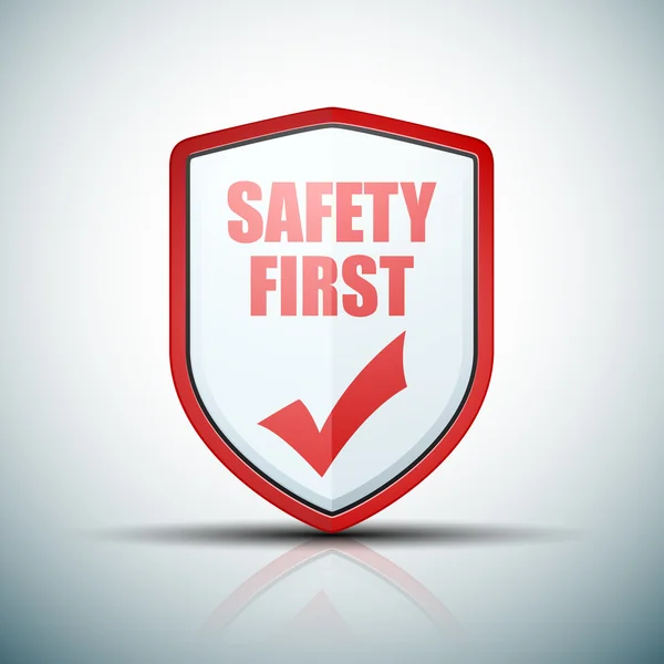 Safety First shield sign — Stock Vector