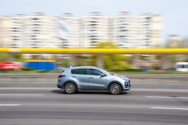 Ukraine, Kyiv - 30 April 2021: Silver KIA Sportage car moving on the street. Editorial