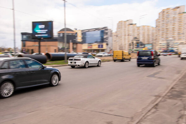 Ukraine, Kyiv - 26 April 2021: Black Audi A3 car moving on the street.  