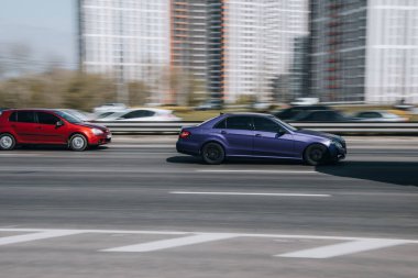 Ukraine, Kyiv - 29 April 2021: Gray Mercedes-Benz E-klasse car moving on the street. Editorial