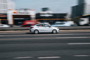 Ukraine, Kyiv - 29 April 2021: White Hyundai Solaris car moving on the street. Editorial
