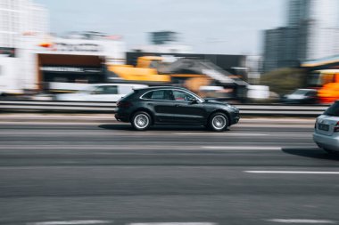 Ukraine, Kyiv - 29 April 2021: Black Ford car moving on the street. Editorial