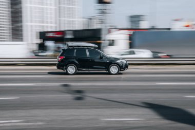 Ukraine, Kyiv - 29 April 2021: Black Subaru Forester car moving on the street. Editorial