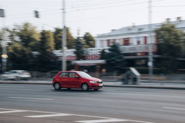 Ukraine, Kyiv - 16 July 2021: Red Skoda Fabia car moving on the street. Editorial