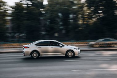 Ukraine, Kyiv - 16 July 2021: Silver Toyota Corolla car moving on the street. Editorial
