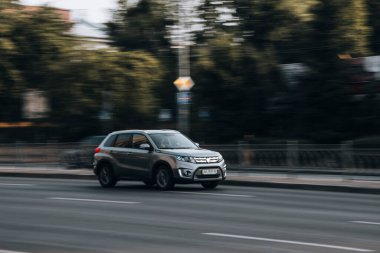 Ukraine, Kyiv - 16 July 2021: Silver Suzuki Vitara car moving on the street. Editorial