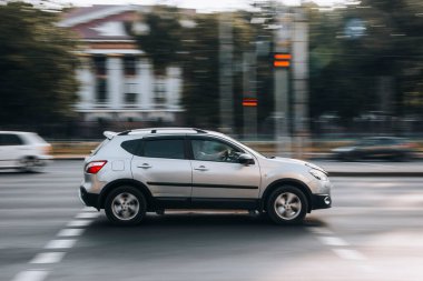 Ukraine, Kyiv - 16 July 2021: Silver Nissan Qashqai car moving on the street. Editorial