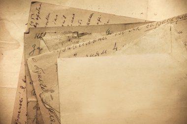 Vintage background with old papers and letters clipart