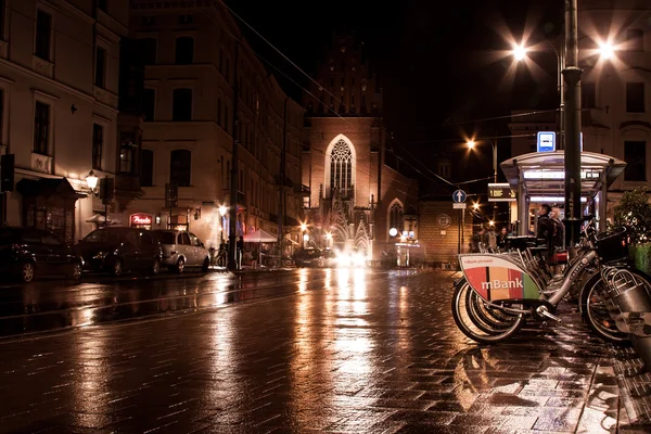 KRAKOW, POLEN - SEPTEMBER 18, 2015: Lej en cykel i Krakow . - Stock-foto