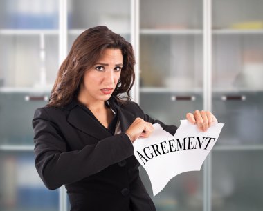 businesswoman tears a document agreement clipart