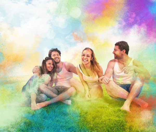 Girls and boys sitting on lawn — Stock Photo, Image