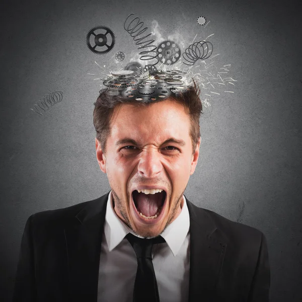 Exhausted businessman screaming — Stock Photo, Image