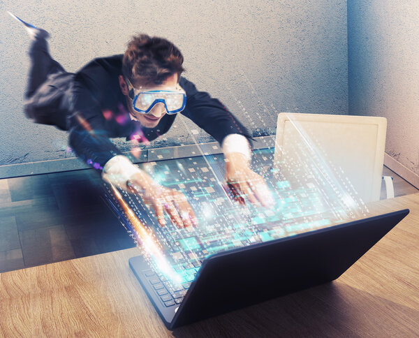 businessman with mask looks at a laptop