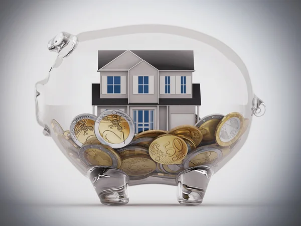 Huis en geld in piggy bank — Stockfoto
