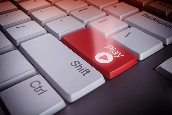 Keyboard with a play red key — Stock Photo, Image