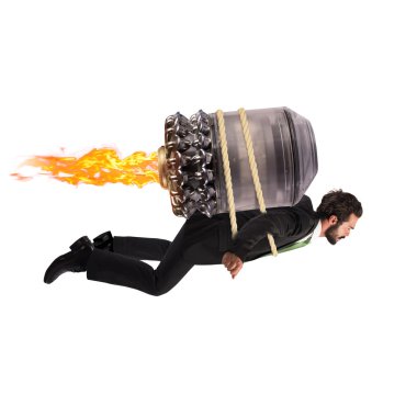 businessman flying with a turbine with fire clipart