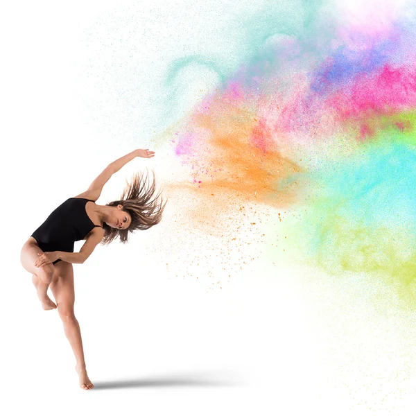 Woman dancing with colored pigments — Stock Photo, Image