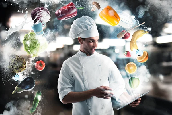 Chef in apron and digital tablet — Stock Photo, Image