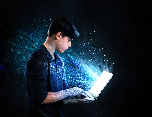 Teen boy using laptop — Stock Photo, Image