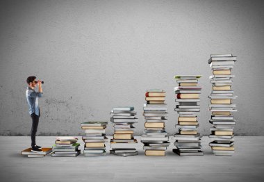 Kitap bir ölçekte dürbünlü çocuk