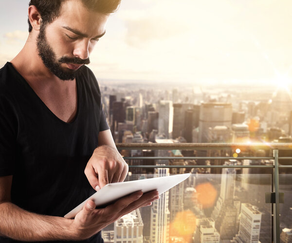 Man using digital tablet 