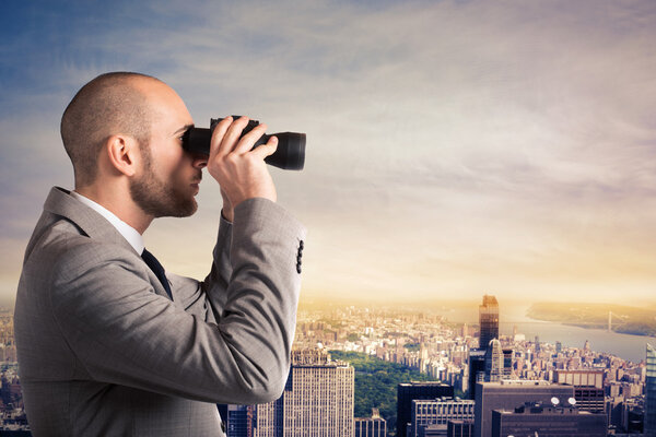 Businessman looking at the city landscape