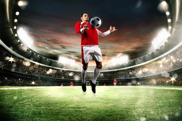 Football player parrying the ball