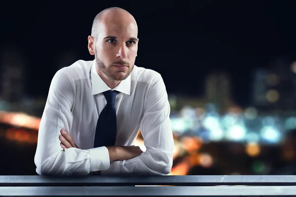 Businessman looking at the city — Stock Photo, Image