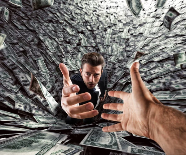 Businessman swallowed by a black hole of money needs help. Concept of failure and economic crisis. — Stock Photo, Image