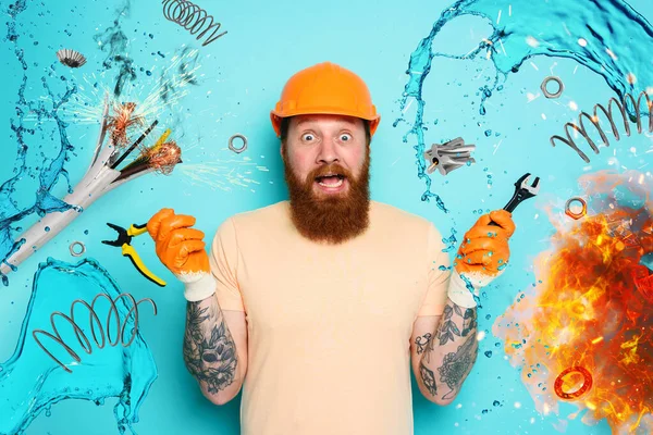 Incompetent worker electrician is unsure about his work. cyan background — Stock Photo, Image