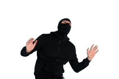 Thief with balaclava was spotted trying to steal in a apartment. Scared expression clipart