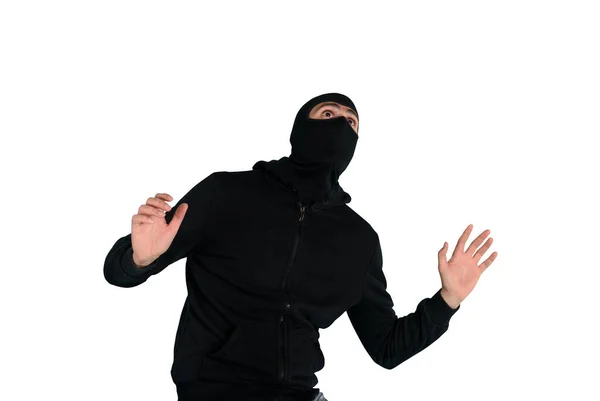 Thief with balaclava was spotted trying to steal in a apartment. Scared expression — Stock Photo, Image