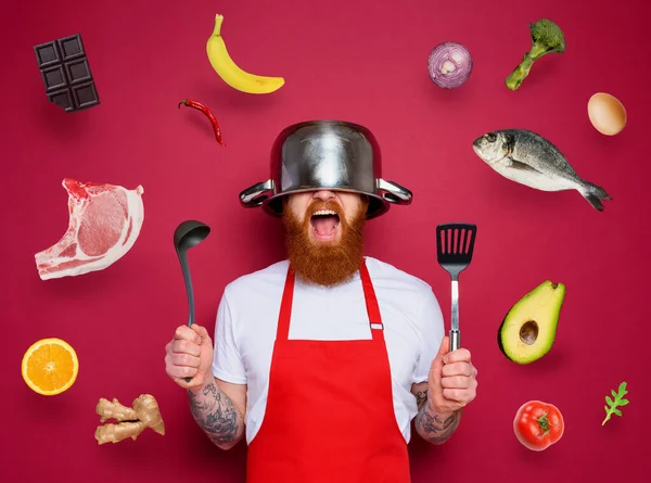 Man chef è pronto a combattere in cucina. bordeaux sfondo — Foto Stock