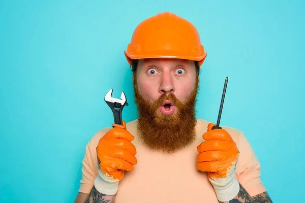 Incompetent worker is unsure and confused about his work — Stock Photo, Image