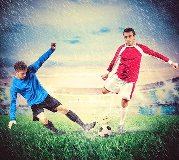 Football players in rain — Stock Photo, Image