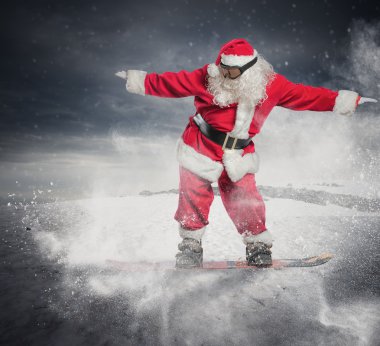 Noel Baba snowboard ile