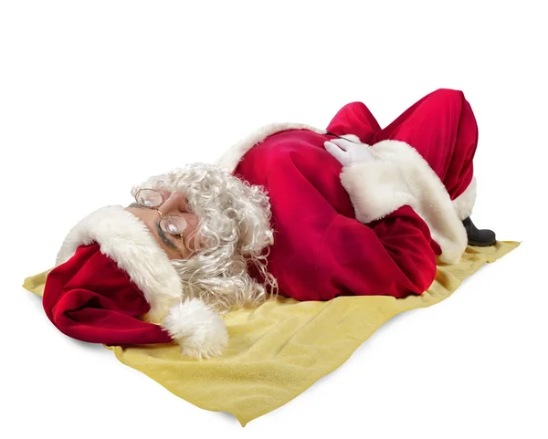 Papá Noel acostado en una alfombra —  Fotos de Stock