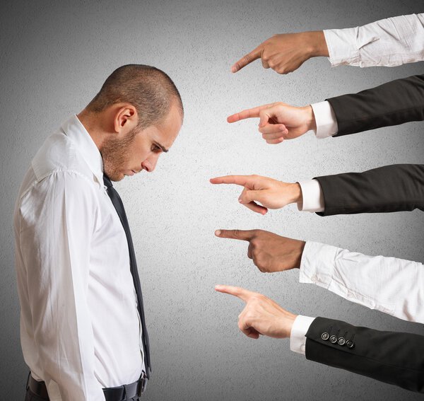 Businessman accused with hands