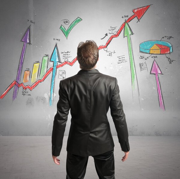 Businessman watchs successful statistics