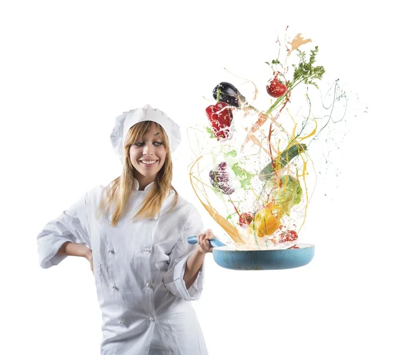 Chef with vegetables on pan — Stock Photo, Image