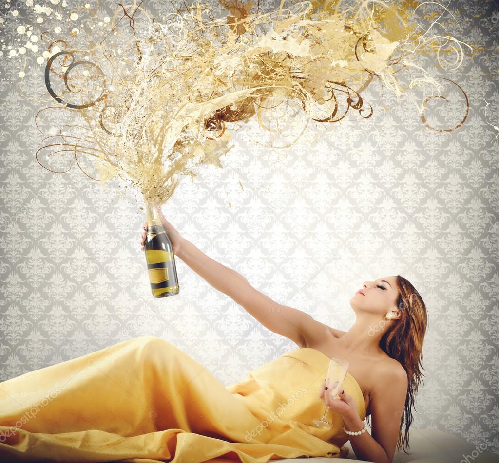 Woman blows up the champagne