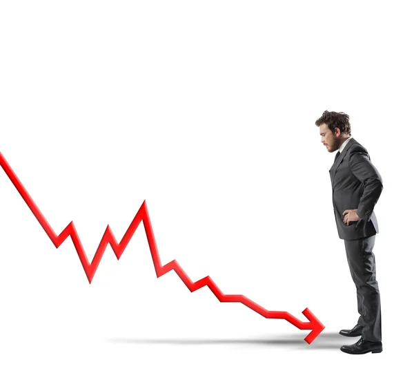 Empresário com estatísticas negativas — Fotografia de Stock