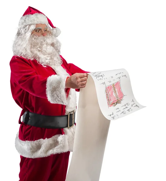 Papai Noel com lista de presentes — Fotografia de Stock