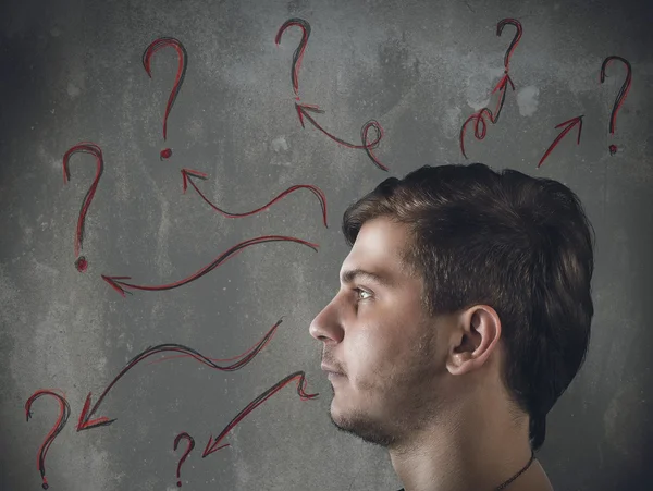Man with doubts and questions — Stock Photo, Image