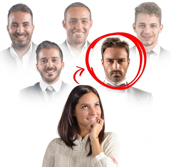 Businesswoman thinks which colleague choose — Stock Photo, Image